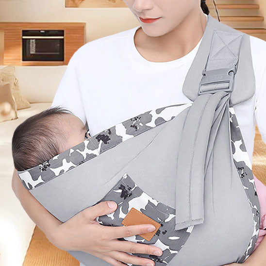 echarpe de portage bebe porte par sa maman en serenite